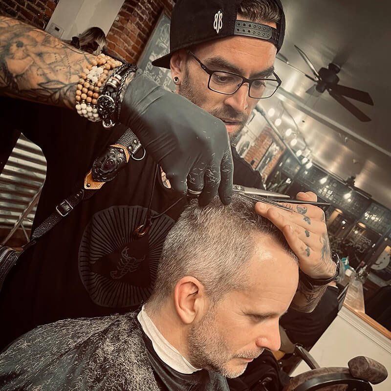 Male Stylist Cutting Man's Hair - The Refinery Hair Studio West Chester PA