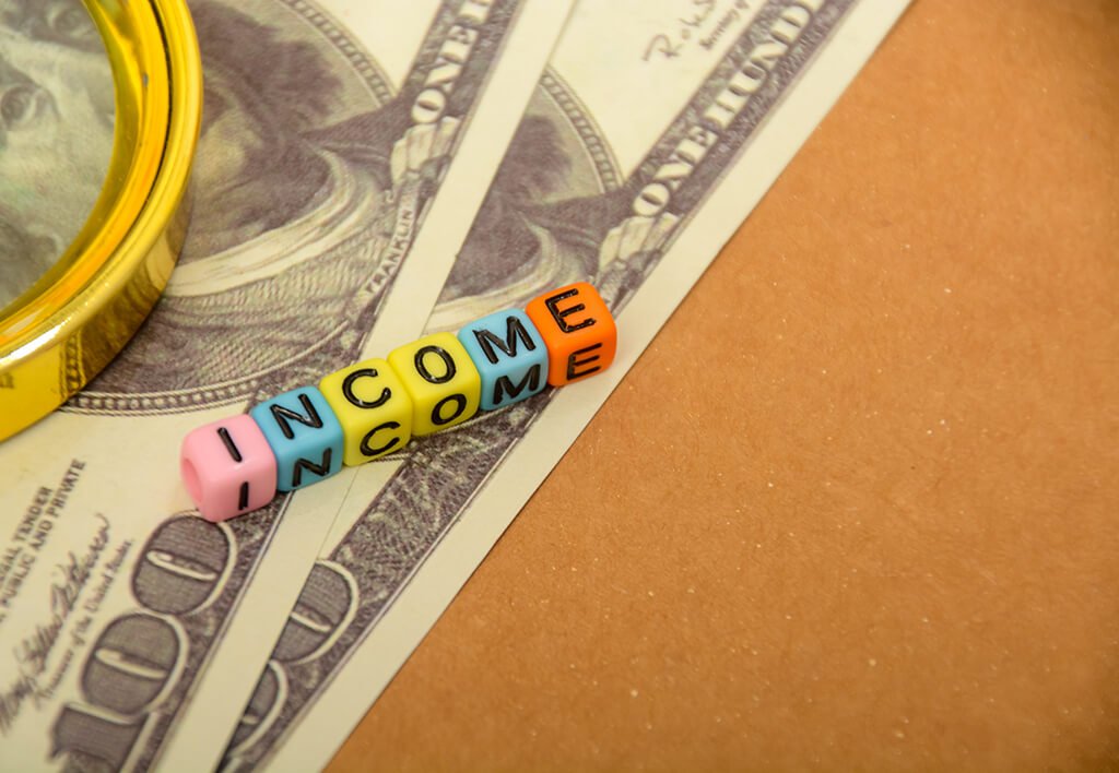 Proof of Income | Two One Hundred Dollar Bills